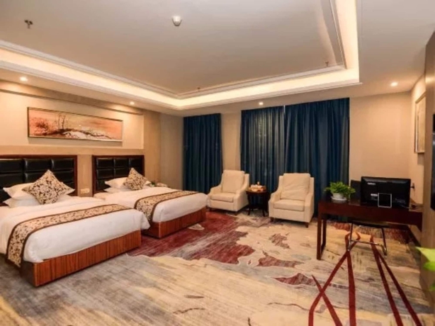 Imagen de la habitación del Hotel Days and Suites Shishi. Foto 7