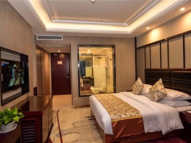 Imagen de la habitación del Hotel Days and Suites Shishi. Foto 10