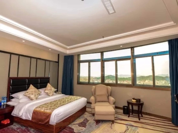 Imagen de la habitación del Hotel Days and Suites Shishi. Foto 11