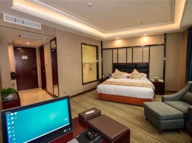 Imagen de la habitación del Hotel Days and Suites Shishi. Foto 12