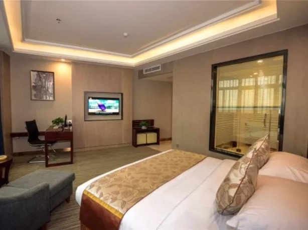 Imagen de la habitación del Hotel Days and Suites Shishi. Foto 15