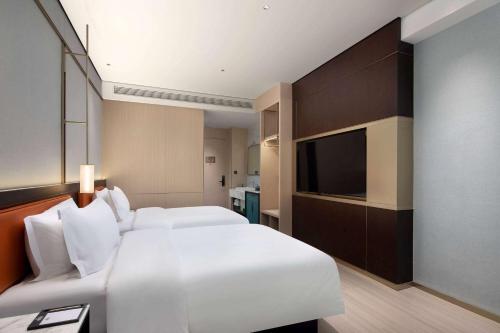 Imagen de la habitación del Hotel Days by Wyndham Changsha Kaifu. Foto 6
