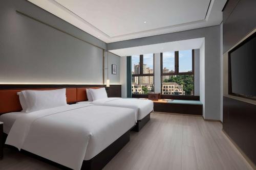 Imagen de la habitación del Hotel Days by Wyndham Changsha Kaifu. Foto 10