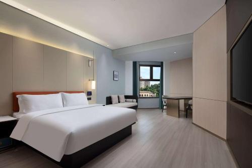 Imagen de la habitación del Hotel Days by Wyndham Changsha Kaifu. Foto 12