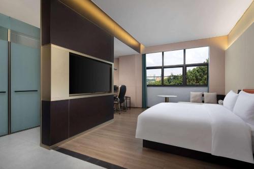 Imagen de la habitación del Hotel Days by Wyndham Changsha Kaifu. Foto 13