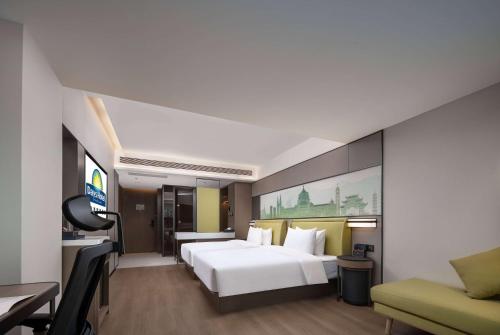 Imagen de la habitación del Hotel Days by Wyndham Chongqing Chenjiaping. Foto 20