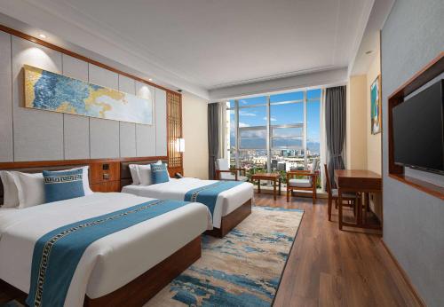 Imagen de la habitación del Hotel Days by Wyndham Dali High-speed Railway Station. Foto 13