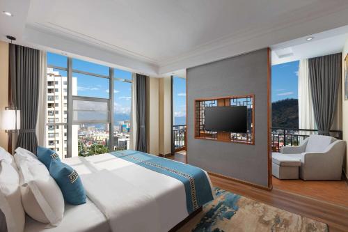 Imagen de la habitación del Hotel Days by Wyndham Dali High-speed Railway Station. Foto 14