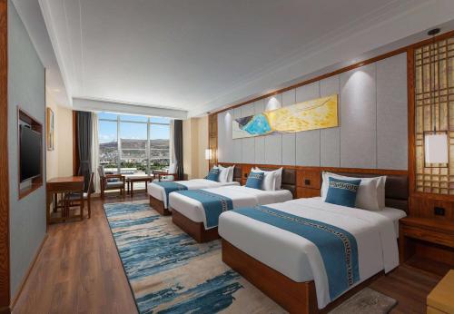 Imagen de la habitación del Hotel Days by Wyndham Dali High-speed Railway Station. Foto 15
