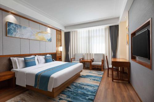 Imagen de la habitación del Hotel Days by Wyndham Dali High-speed Railway Station. Foto 17