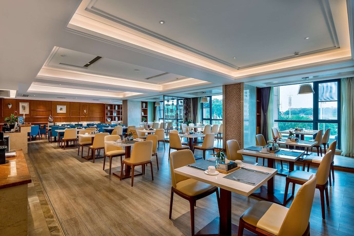 Imagen del bar/restaurante del Hotel Days by Wyndham Hunan Changsha Convoy. Foto 4