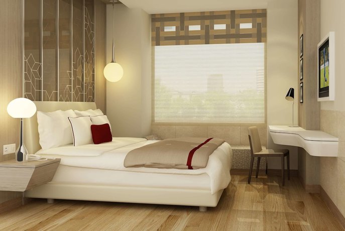 Imagen de la habitación del Hotel Days by Wyndham Jaipur Tonk Road. Foto 17