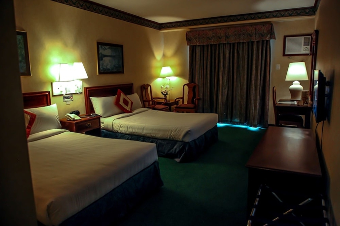 Imagen de la habitación del Hotel Days by Wyndham Tagaytay. Foto 4