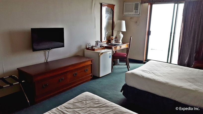 Imagen de la habitación del Hotel Days by Wyndham Tagaytay. Foto 5