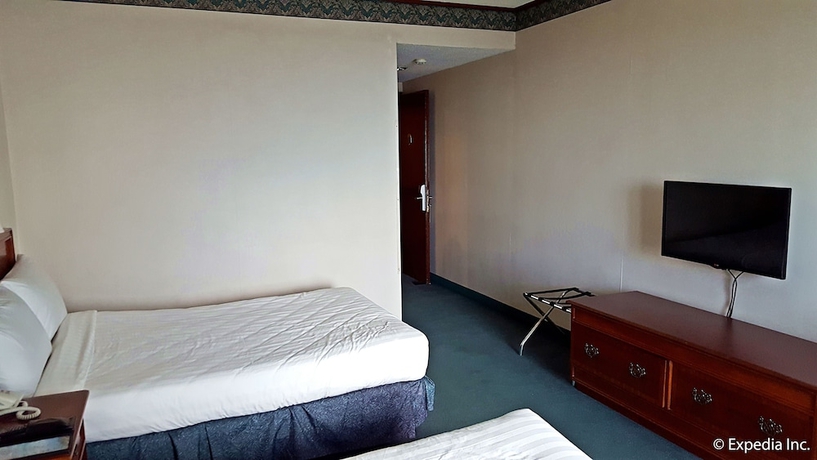 Imagen de la habitación del Hotel Days by Wyndham Tagaytay. Foto 7