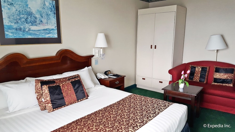 Imagen de la habitación del Hotel Days by Wyndham Tagaytay. Foto 8