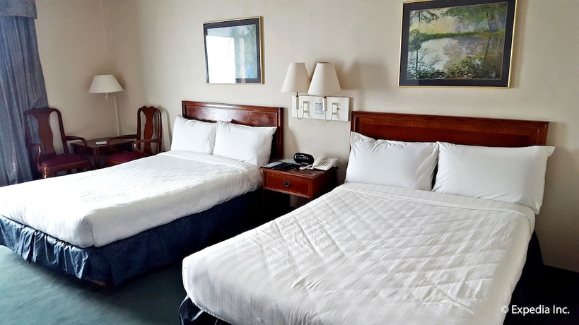 Imagen de la habitación del Hotel Days by Wyndham Tagaytay. Foto 11