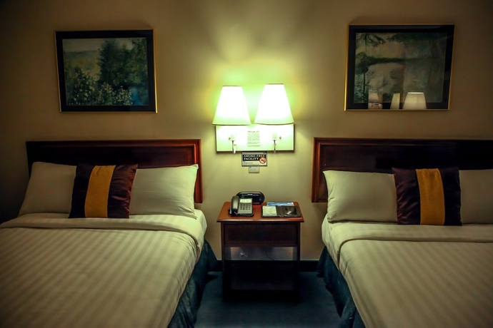 Imagen de la habitación del Hotel Days by Wyndham Tagaytay. Foto 12