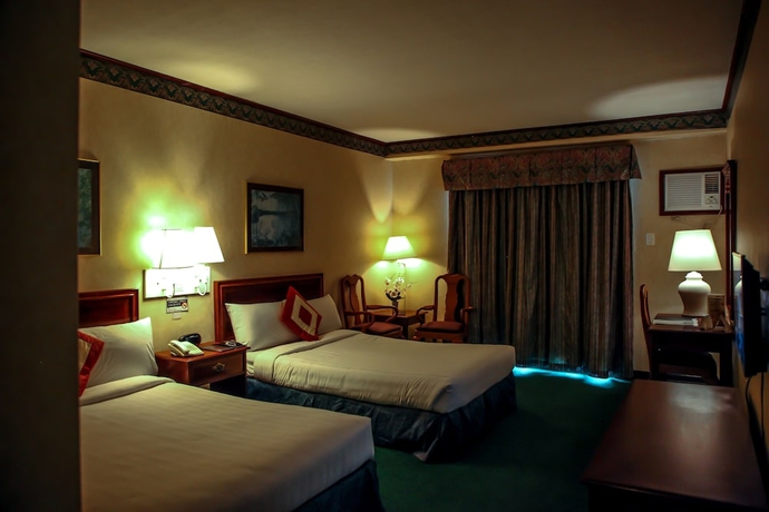 Imagen de la habitación del Hotel Days by Wyndham Tagaytay. Foto 13