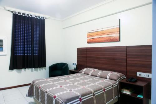 Imagen de la habitación del Hotel Days inn by Wyndham Uberl&acirc;ndia. Foto 8