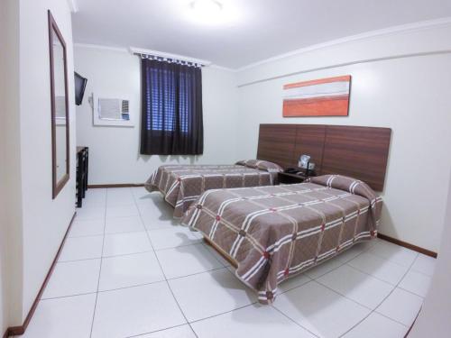 Imagen de la habitación del Hotel Days inn by Wyndham Uberl&acirc;ndia. Foto 11
