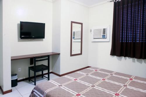 Imagen de la habitación del Hotel Days inn by Wyndham Uberl&acirc;ndia. Foto 13