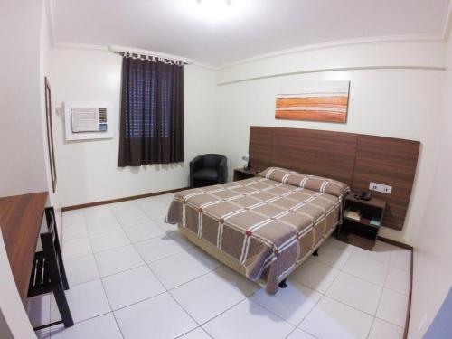 Imagen de la habitación del Hotel Days inn by Wyndham Uberl&acirc;ndia. Foto 14