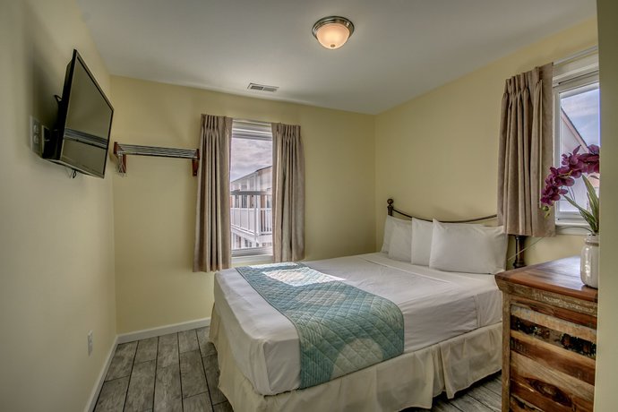 Imagen de la habitación del Hotel Daytona Inn And Suites. Foto 19