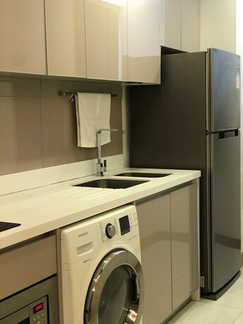 Imagen de la habitación del Hotel Dazzle Residence. Foto 23
