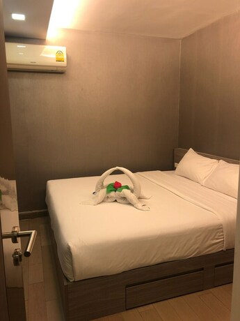 Imagen de la habitación del Hotel Dazzle Residence. Foto 26
