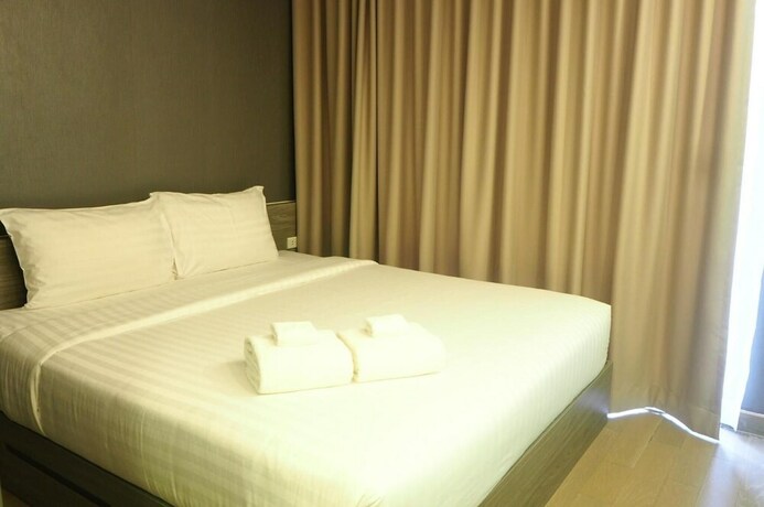 Imagen de la habitación del Hotel Dazzle Residence. Foto 30