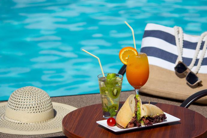 Imagen de la piscina del Hotel Dazzler By Wyndham Colonia. Foto 18