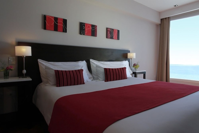 Imagen de la habitación del Hotel Dazzler By Wyndham Puerto Madryn. Foto 2