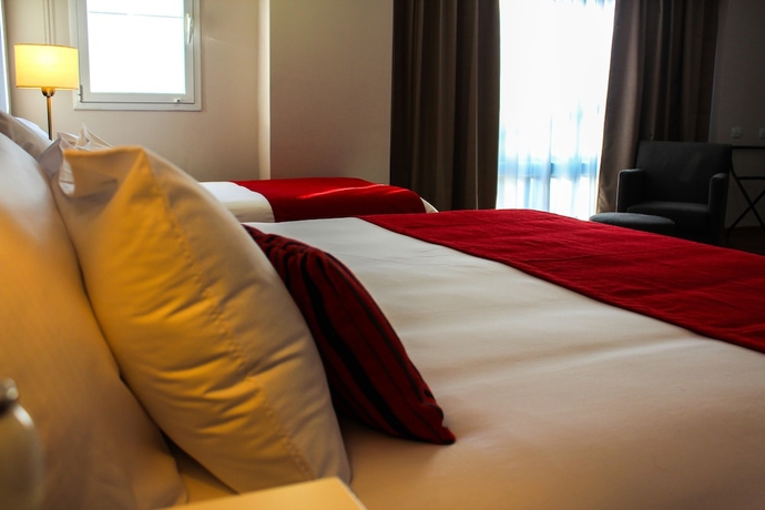 Imagen de la habitación del Hotel Dazzler By Wyndham Puerto Madryn. Foto 4