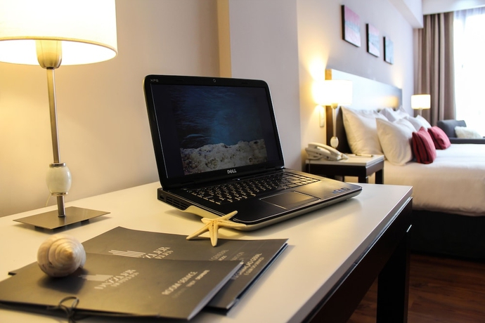 Imagen de la habitación del Hotel Dazzler By Wyndham Puerto Madryn. Foto 7