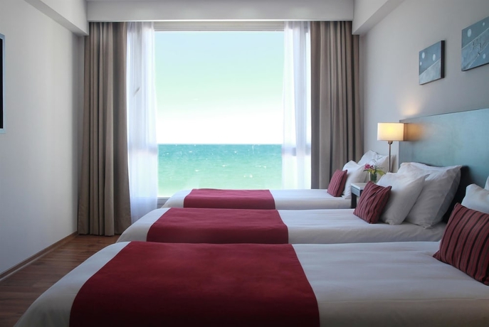 Imagen de la habitación del Hotel Dazzler By Wyndham Puerto Madryn. Foto 10