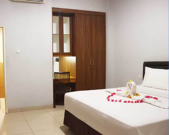 Imagen de la habitación del Hotel D'bamboo Suites. Foto 3