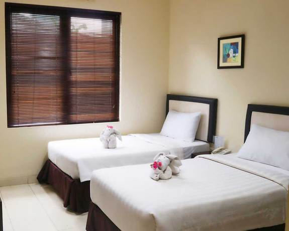 Imagen de la habitación del Hotel D'bamboo Suites. Foto 4