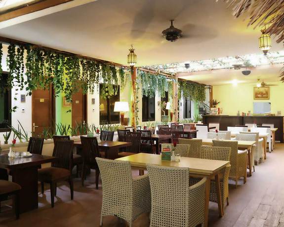 Imagen del bar/restaurante del Hotel D'bamboo Suites. Foto 2