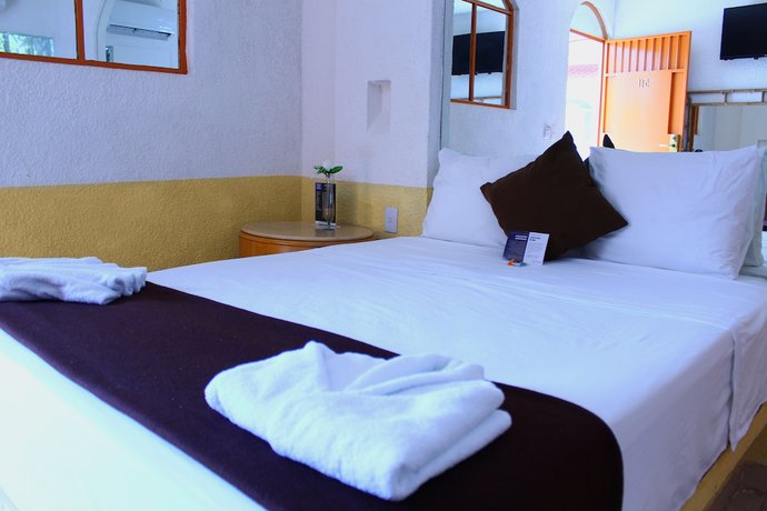 Imagen de la habitación del Hotel D'cesar Acapulco. Foto 7