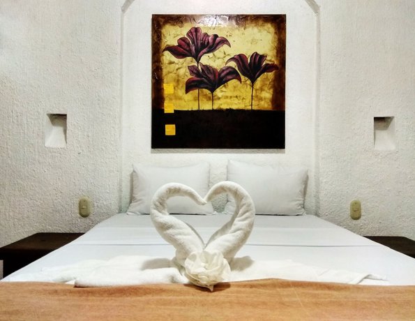 Imagen de la habitación del Hotel D'cesar Acapulco. Foto 12