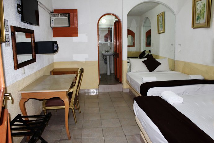 Imagen de la habitación del Hotel D'cesar Acapulco. Foto 15
