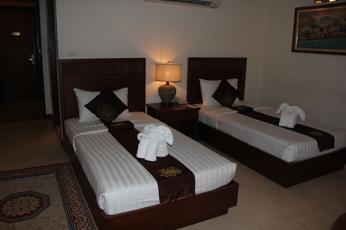 Imagen de la habitación del Hotel De Arni Bangkok. Foto 10