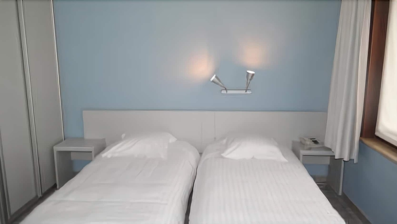 Imagen de la habitación del Hotel De Bonte Os and Tower. Foto 11