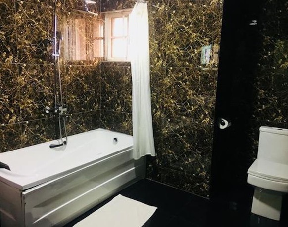 Imagen de la habitación del Hotel De Brit. Foto 9