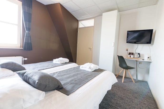 Imagen de la habitación del Hotel De Buizerd. Foto 9
