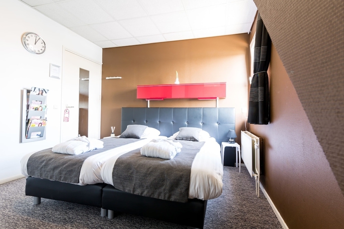 Imagen de la habitación del Hotel De Buizerd. Foto 10