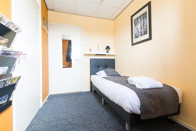 Imagen de la habitación del Hotel De Buizerd. Foto 13