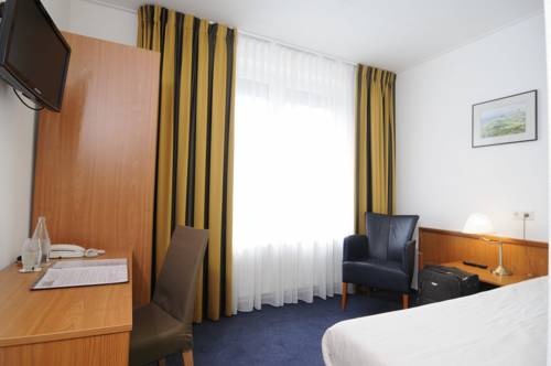 Imagen de la habitación del Hotel De Burg. Foto 5