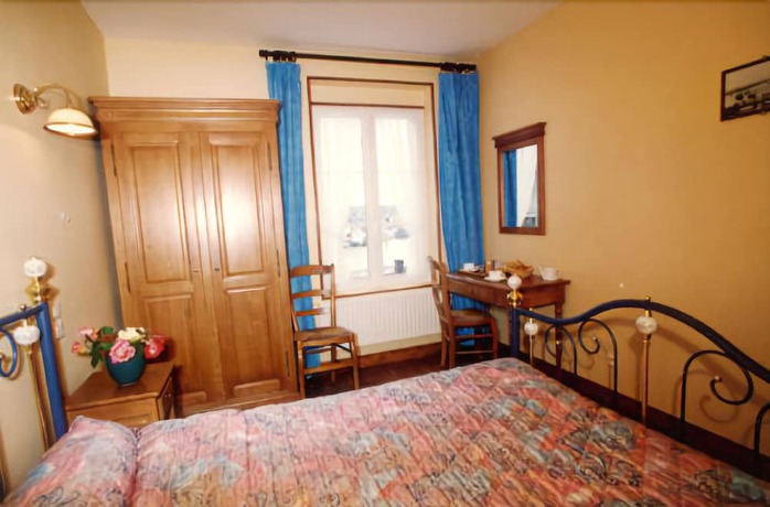 Imagen de la habitación del Hotel De Calais. Foto 7